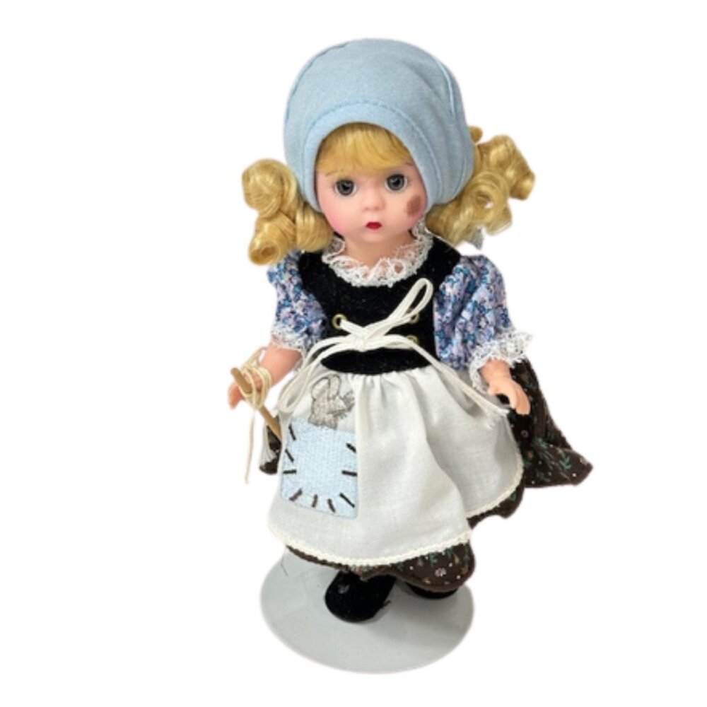 Madame Alexander restrung 8" Poor Cinderella doll with stand.
